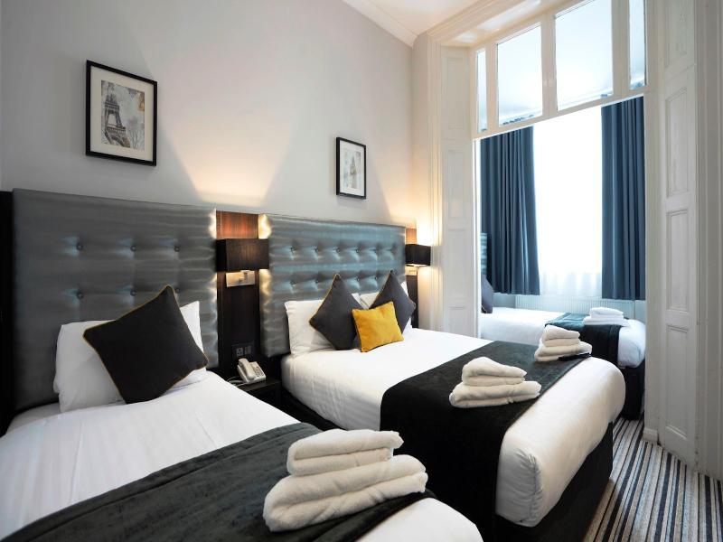 Chambre Quadruple avec Douche et Toilettes Privatives
